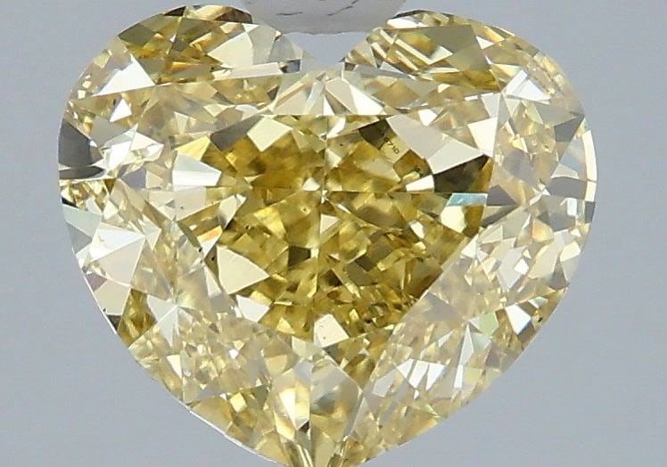 Loose Diamond - HEART 3.1ct Fancy Intense Yellow VS1: Loose Diamond - HEART 3.1ct Fancy Intense Yellow VS1 Source: This is a real non-mined Diamond that has been grown in a lab Shape: HEART Carats: 3.1 Color: Fancy Intense Yellow Certification: IGI Video