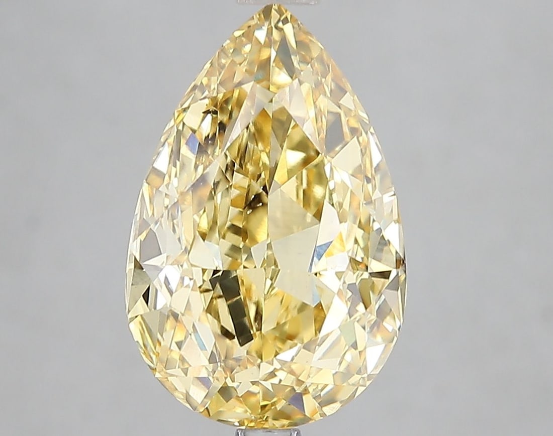 Loose Diamond - PEAR 5.04ct Fancy Intense Yellow VS2: Loose Diamond - PEAR 5.04ct Fancy Intense Yellow VS2 Source: This is a real non-mined Diamond that has been grown in a lab Shape: PEAR Carats: 5.04 Color: Fancy Intense Yellow Certification: IGI Video