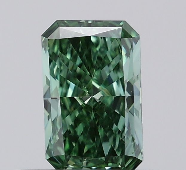 Loose Diamond - RADIANT 0.38ct Fancy Vivid Green VS1: Loose Diamond - RADIANT 0.38ct Fancy Vivid Green VS1 Source: This is a real non-mined Diamond that has been grown in a lab Shape: RADIANT Carats: 0.38 Color: Fancy Vivid Green Certification: IGI Video