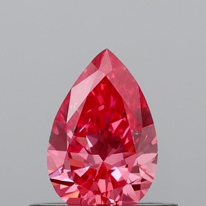 Loose Diamond - PEAR 0.45ct Fancy Vivid Pink VS2: Loose Diamond - PEAR 0.45ct Fancy Vivid Pink VS2 Source: This is a real non-mined Diamond that has been grown in a lab Shape: PEAR Carats: 0.45 Color: Fancy Vivid Pink Certification: IGI Video: