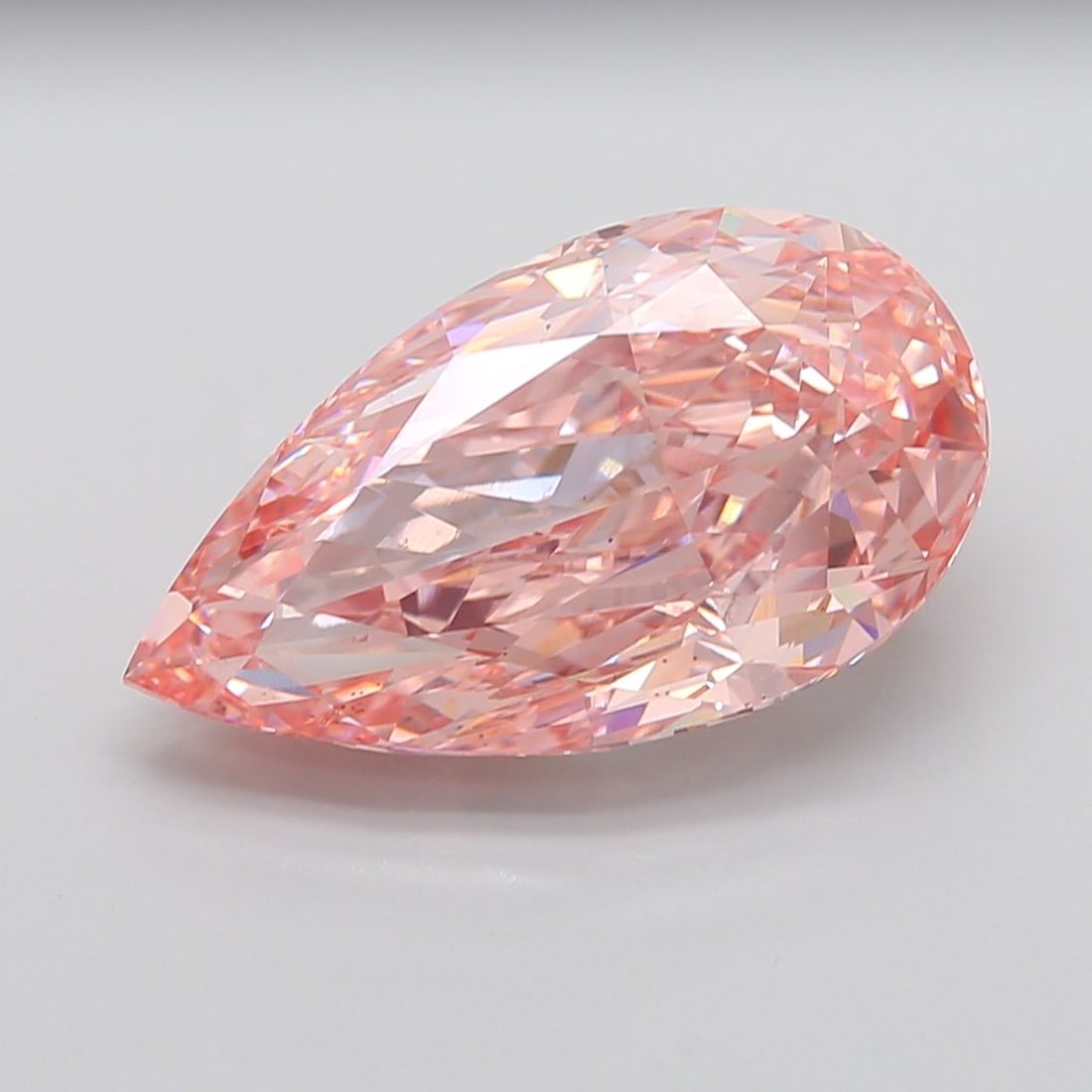 Loose Diamond - PEAR 13.07ct Fancy Intense Pink VS1: Loose Diamond - PEAR 13.07ct Fancy Intense Pink VS1 Source: This is a real non-mined Diamond that has been grown in a lab Shape: PEAR Carats: 13.07 Color: Fancy Intense Pink Certification: IGI PLEASE 