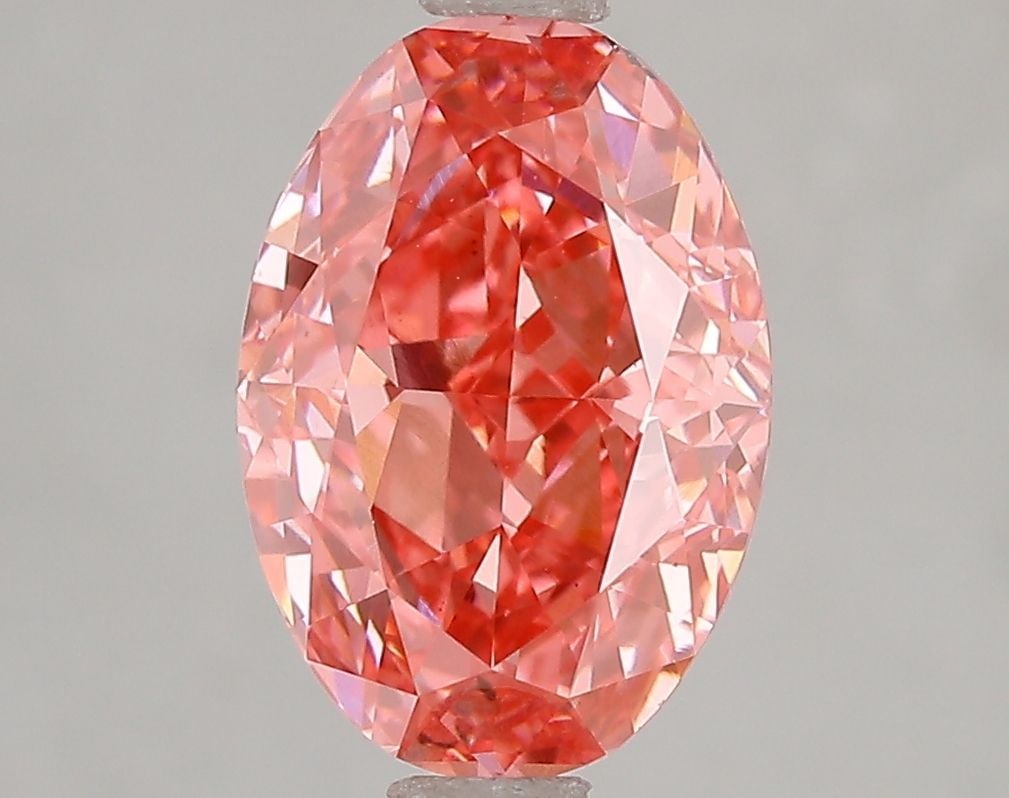 Loose Diamond - OVAL 3.01ct Fancy Vivid Pink VS2: Loose Diamond - OVAL 3.01ct Fancy Vivid Pink VS2 Source: This is a real non-mined Diamond that has been grown in a lab Shape: OVAL Carats: 3.01 Color: Fancy Vivid Pink Certification: IGI Video: