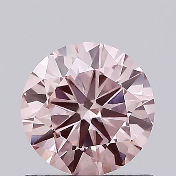 Loose Diamond - ROUND 0.64ct Fancy Intense Pink VVS2: Loose Diamond - ROUND 0.64ct Fancy Intense Pink VVS2 Source: This is a real non-mined Diamond that has been grown in a lab Shape: ROUND Carats: 0.64 Color: Fancy Intense Pink Certification: IGI Video: