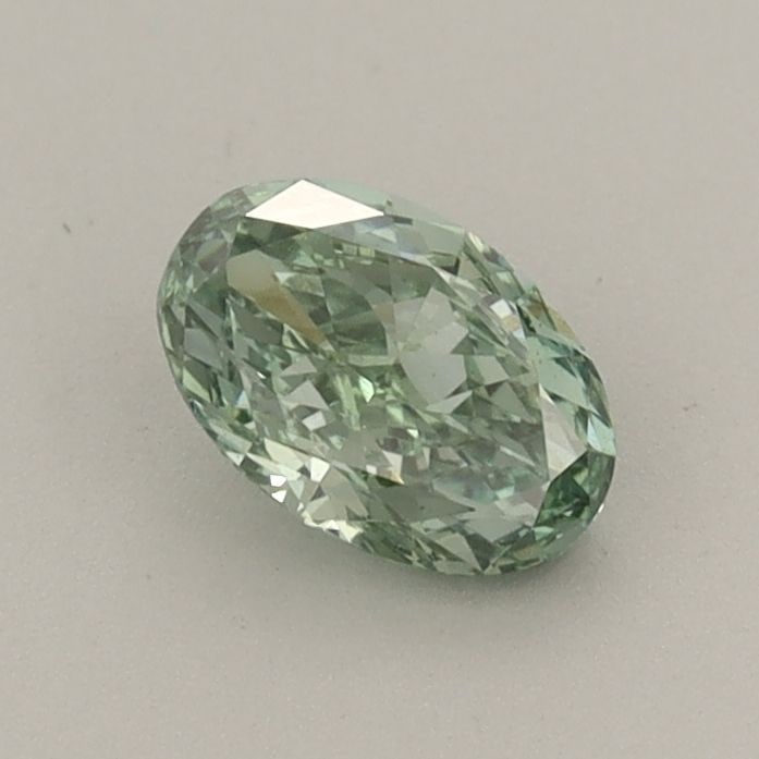 Loose Diamond - OVAL 0.54ct Fancy Vivid Green VVS2: Loose Diamond - OVAL 0.54ct Fancy Vivid Green VVS2 Source: This is a real non-mined Diamond that has been grown in a lab Shape: OVAL Carats: 0.54 Color: Fancy Vivid Green Certification: IGI Video: