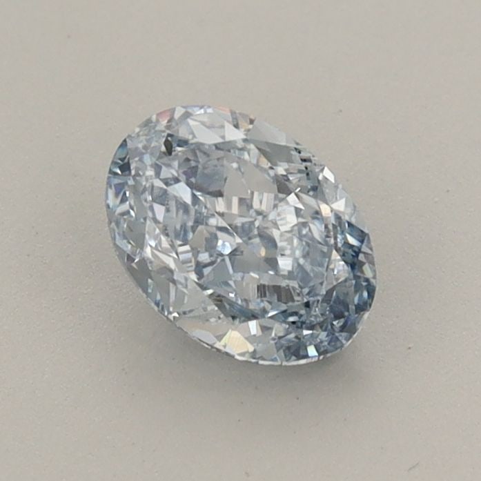 Loose Diamond - OVAL 0.7ct Fancy Blue VVS2: Loose Diamond - OVAL 0.7ct Fancy Blue VVS2 Source: This is a real non-mined Diamond that has been grown in a lab Shape: OVAL Carats: 0.7 Color: Fancy Blue Certification: IGI Video: