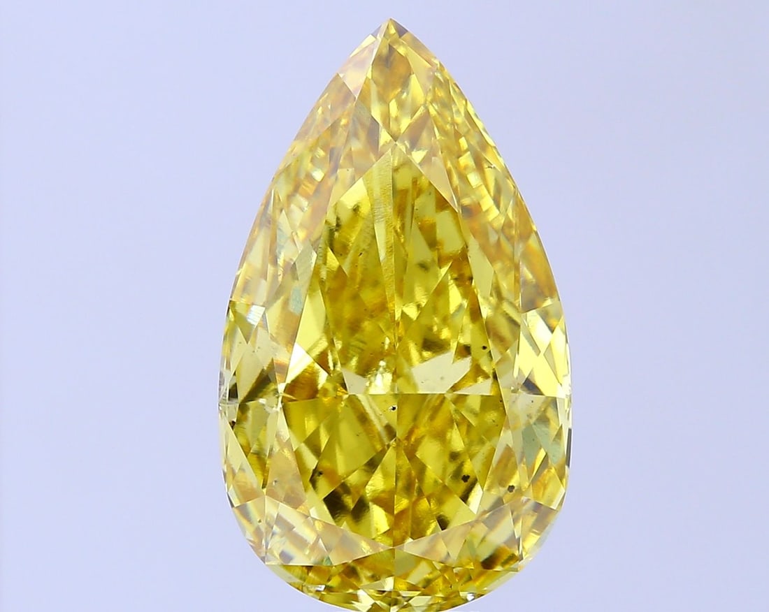 Loose Diamond - PEAR 12.69ct Fancy Vivid Yellow VS2: Loose Diamond - PEAR 12.69ct Fancy Vivid Yellow VS2 Source: This is a real non-mined Diamond that has been grown in a lab Shape: PEAR Carats: 12.69 Color: Fancy Vivid Yellow Certification: IGI Video: