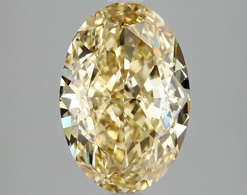 Loose Diamond - OVAL 4.1ct Fancy Intense Yellow VVS2: Loose Diamond - OVAL 4.1ct Fancy Intense Yellow VVS2 Source: This is a real non-mined Diamond that has been grown in a lab Shape: OVAL Carats: 4.1 Color: Fancy Intense Yellow Certification: IGI Video: