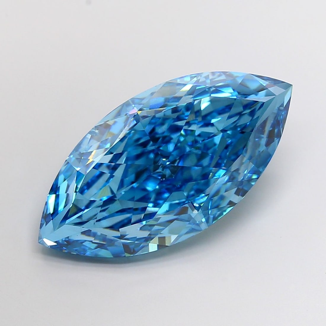 Loose Diamond - MARQUISE 27.3ct Fancy Vivid Blue SI1: Loose Diamond - MARQUISE 27.3ct Fancy Vivid Blue SI1 Source: This is a real non-mined Diamond that has been grown in a lab Shape: MARQUISE Carats: 27.3 Color: Fancy Vivid Blue Certification: IGI Video