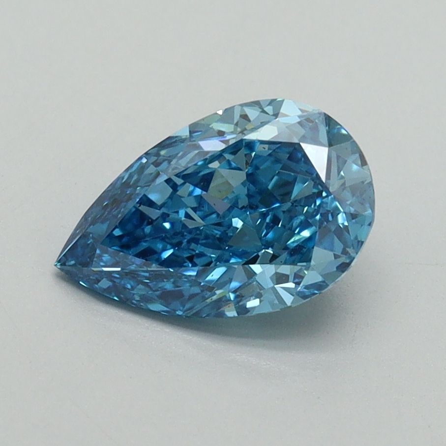 Loose Diamond - PEAR 1.23ct Fancy Vivid Blue VS2: Loose Diamond - PEAR 1.23ct Fancy Vivid Blue VS2 Source: This is a real non-mined Diamond that has been grown in a lab Shape: PEAR Carats: 1.23 Color: Fancy Vivid Blue Certification: IGI Video: