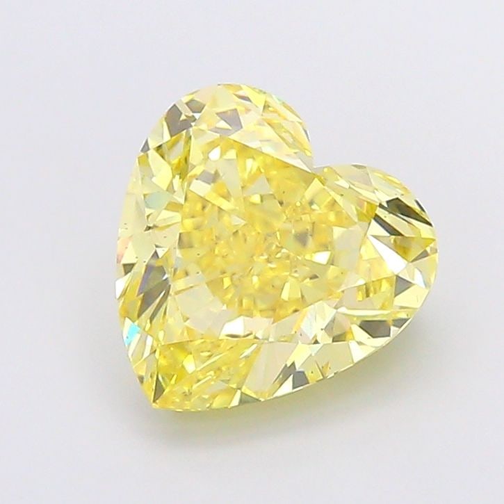 Loose Diamond - HEART 5.02ct Fancy Vivid Yellow VS2: Loose Diamond - HEART 5.02ct Fancy Vivid Yellow VS2 Source: This is a real non-mined Diamond that has been grown in a lab Shape: HEART Carats: 5.02 Color: Fancy Vivid Yellow Certification: IGI Video:
