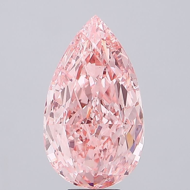 Loose Diamond - PEAR 10.01ct Fancy Vivid Pink VS1: Loose Diamond - PEAR 10.01ct Fancy Vivid Pink VS1 Source: This is a real non-mined Diamond that has been grown in a lab Shape: PEAR Carats: 10.01 Color: Fancy Vivid Pink Certification: IGI PLEASE
