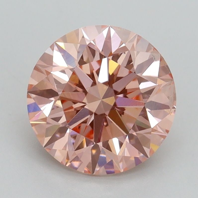 Loose Diamond - ROUND 2.02ct Fancy Intense Pink SI1: Loose Diamond - ROUND 2.02ct Fancy Intense Pink SI1 Source: This is a real non-mined Diamond that has been grown in a lab Shape: ROUND Carats: 2.02 Color: Fancy Intense Pink Certification: IGI Video: