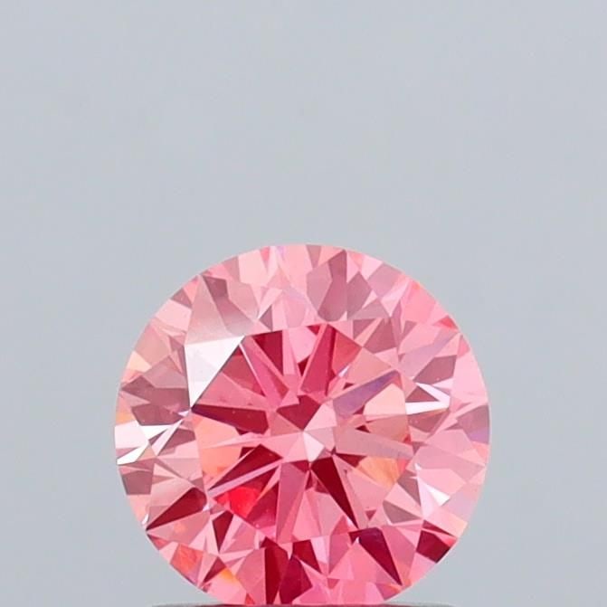 Loose Diamond - ROUND 1.08ct Fancy Vivid Pink VS1: Loose Diamond - ROUND 1.08ct Fancy Vivid Pink VS1 Source: This is a real non-mined Diamond that has been grown in a lab Shape: ROUND Carats: 1.08 Color: Fancy Vivid Pink Certification: IGI Video: