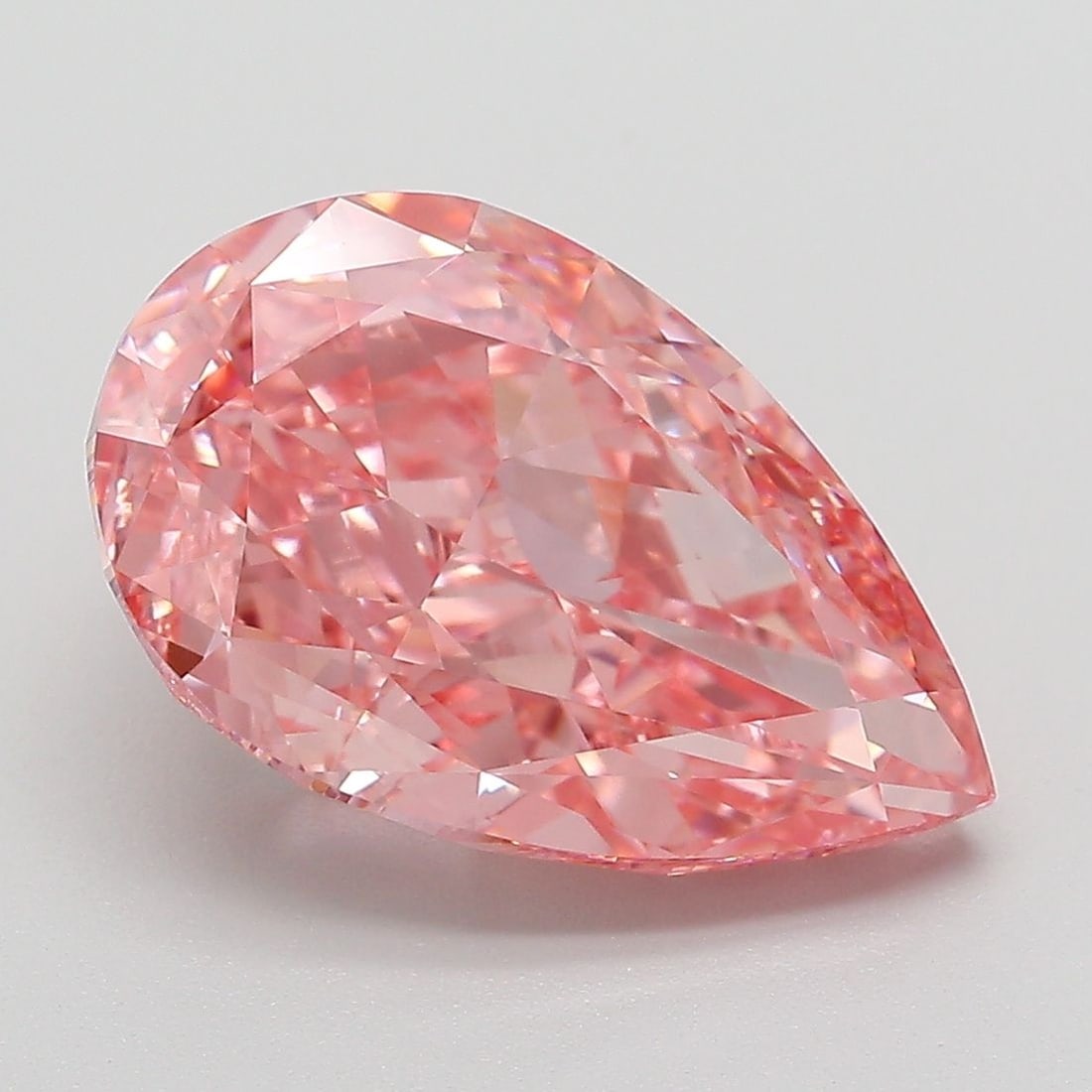 Loose Diamond - PEAR 5.29ct Fancy Vivid Pink VVS2: Loose Diamond - PEAR 5.29ct Fancy Vivid Pink VVS2 Source: This is a real non-mined Diamond that has been grown in a lab Shape: PEAR Carats: 5.29 Color: Fancy Vivid Pink Certification: IGI Video: