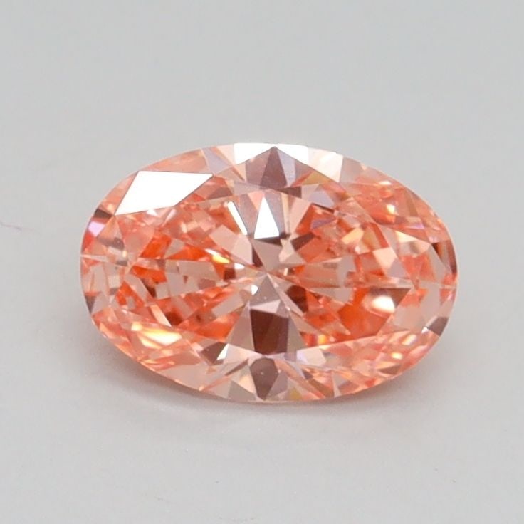 Loose Diamond - OVAL 0.66ct Fancy Vivid Pink VS2: Loose Diamond - OVAL 0.66ct Fancy Vivid Pink VS2 Source: This is a real non-mined Diamond that has been grown in a lab Shape: OVAL Carats: 0.66 Color: Fancy Vivid Pink Certification: IGI Video: