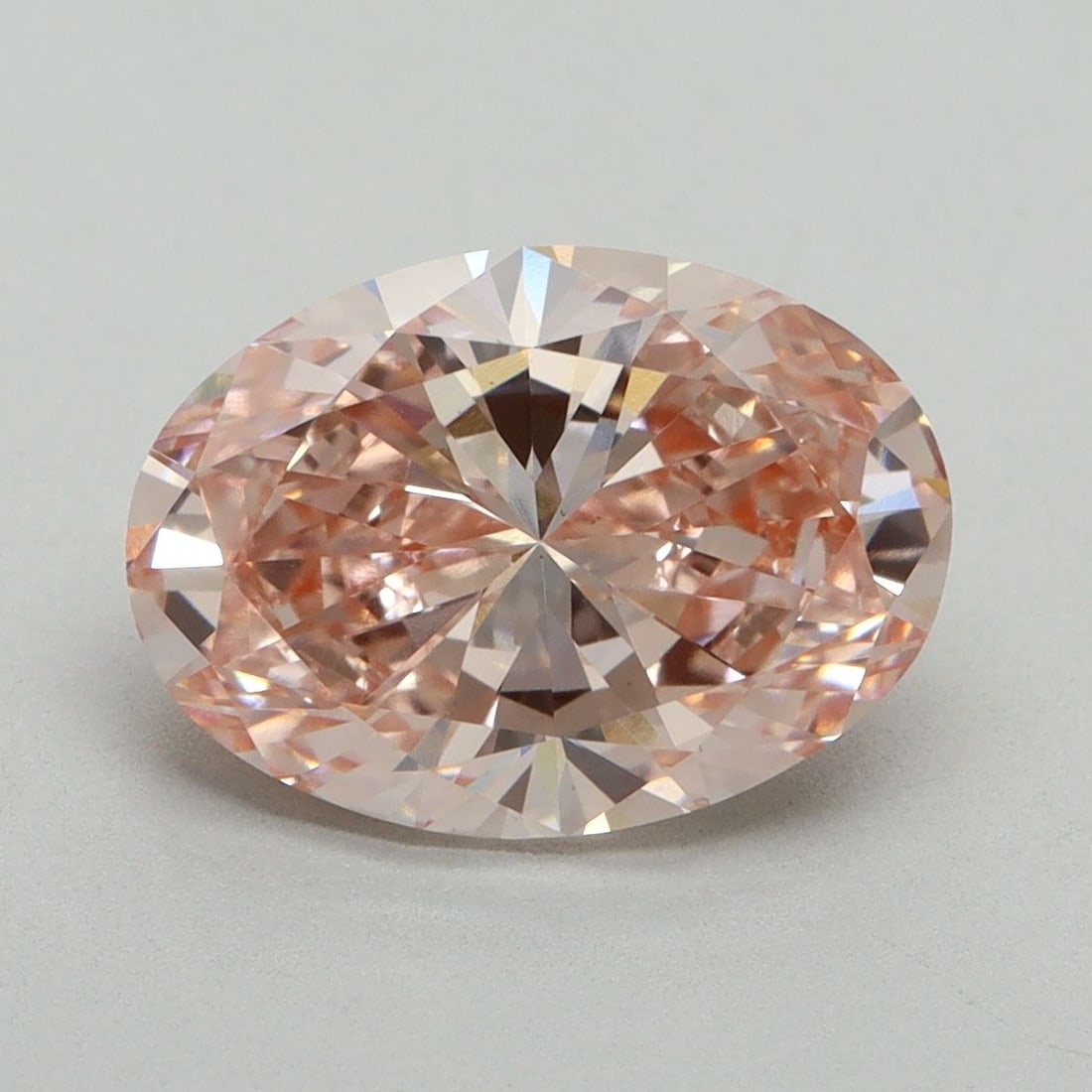 Loose Diamond - OVAL 3.05ct Fancy Vivid Pink VS1: Loose Diamond - OVAL 3.05ct Fancy Vivid Pink VS1 Source: This is a real non-mined Diamond that has been grown in a lab Shape: OVAL Carats: 3.05 Color: Fancy Vivid Pink Certification: IGI Video: Video