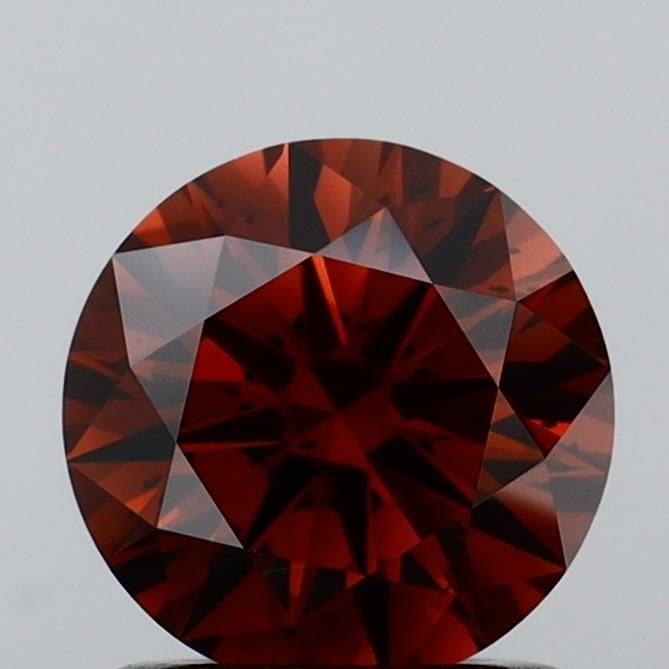 Ideal Loose Diamond - ROUND 1.07ct Fancy Orangey Brown SI1: Ideal Loose Diamond - ROUND 1.07ct Fancy Orangey Brown SI1 Source: This is a real non-mined Diamond that has been grown in a lab Shape: ROUND Carats: 1.07 Color: Fancy Orangey Brown Certification: IGI