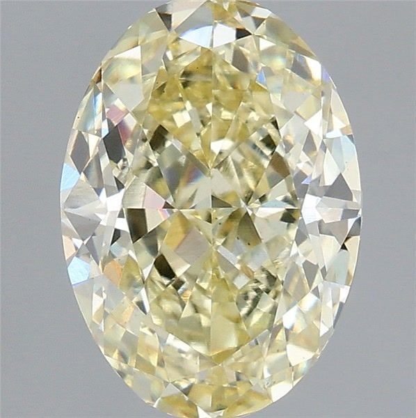 Loose Diamond - OVAL 3.09ct Fancy Yellow VS1: Loose Diamond - OVAL 3.09ct Fancy Yellow VS1 Source: This is a real non-mined Diamond that has been grown in a lab Shape: OVAL Carats: 3.09 Color: Fancy Yellow Certification: IGI Video:
