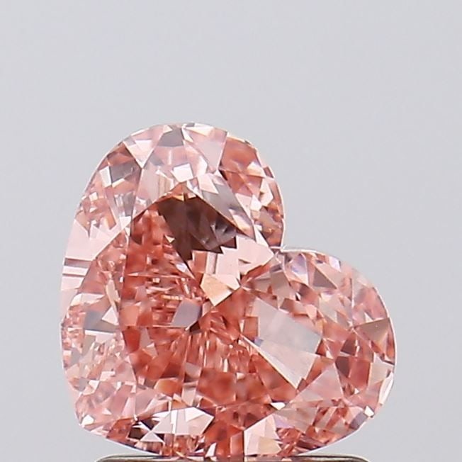 Loose Diamond - HEART 1.51ct Fancy Vivid Pink VVS2: Loose Diamond - HEART 1.51ct Fancy Vivid Pink VVS2 Source: This is a real non-mined Diamond that has been grown in a lab Shape: HEART Carats: 1.51 Color: Fancy Vivid Pink Certification: IGI Video: