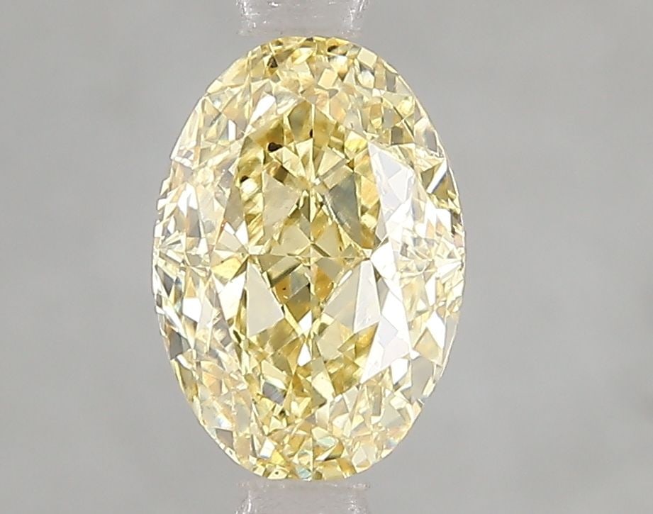 Loose Diamond - OVAL 2.02ct Fancy Intense Yellow VS1: Loose Diamond - OVAL 2.02ct Fancy Intense Yellow VS1 Source: This is a real non-mined Diamond that has been grown in a lab Shape: OVAL Carats: 2.02 Color: Fancy Intense Yellow Certification: IGI Video