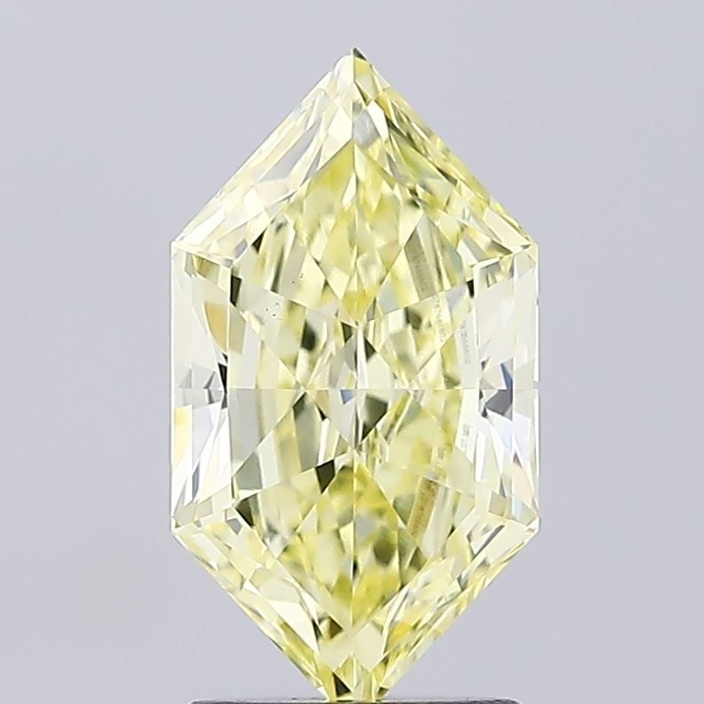 Loose Diamond - HEXAGONAL 2.14ct Fancy Yellow VS1: Loose Diamond - HEXAGONAL 2.14ct Fancy Yellow VS1 Source: This is a real non-mined Diamond that has been grown in a lab Shape: HEXAGONAL Carats: 2.14 Color: Fancy Yellow Certification: IGI Video: