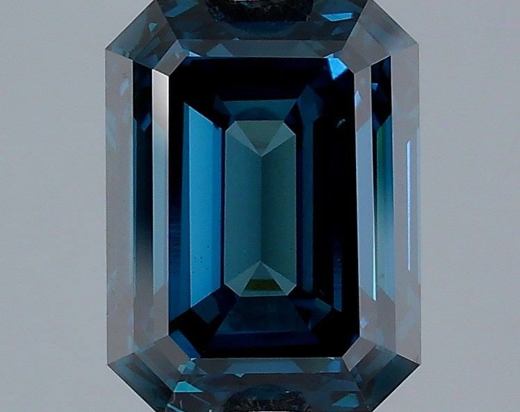 Loose Diamond - EMERALD 2.51ct Fancy Vivid Blue VS1: Loose Diamond - EMERALD 2.51ct Fancy Vivid Blue VS1 Source: This is a real non-mined Diamond that has been grown in a lab Shape: EMERALD Carats: 2.51 Color: Fancy Vivid Blue Certification: IGI Video: