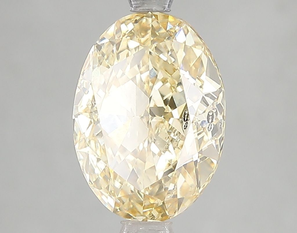 Loose Diamond - OVAL 3.0ct Fancy Intense Yellow SI2: Loose Diamond - OVAL 3.0ct Fancy Intense Yellow SI2 Source: This is a real non-mined Diamond that has been grown in a lab Shape: OVAL Carats: 3.0 Color: Fancy Intense Yellow Certification: IGI Video: