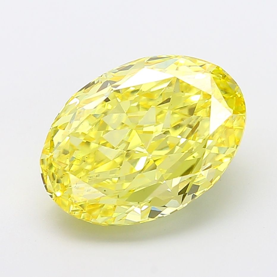 Loose Diamond - OVAL 9.01ct Fancy Vivid Yellow VS2: Loose Diamond - OVAL 9.01ct Fancy Vivid Yellow VS2 Source: This is a real non-mined Diamond that has been grown in a lab Shape: OVAL Carats: 9.01 Color: Fancy Vivid Yellow Certification: IGI Video: