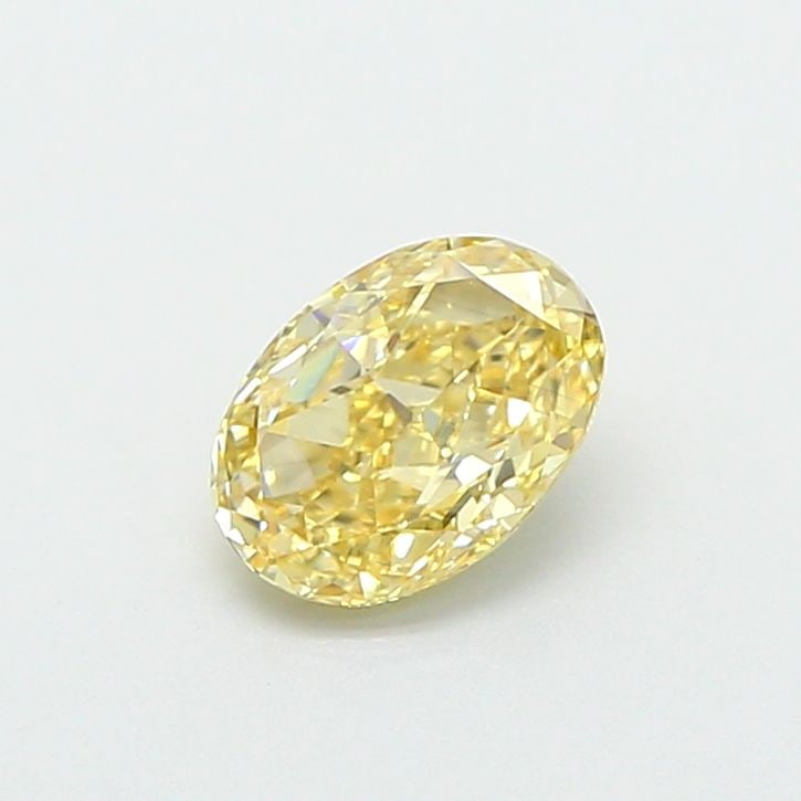 Loose Diamond - OVAL 0.71ct Fancy Yellow VS2: Loose Diamond - OVAL 0.71ct Fancy Yellow VS2 Source: This is a real non-mined Diamond that has been grown in a lab Shape: OVAL Carats: 0.71 Color: Fancy Yellow Certification: IGI Video: