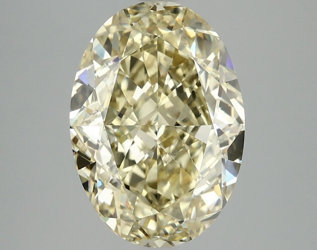 Loose Diamond - OVAL 5.0ct Fancy Vivid Yellow VS1: Loose Diamond - OVAL 5.0ct Fancy Vivid Yellow VS1 Source: This is a real non-mined Diamond that has been grown in a lab Shape: OVAL Carats: 5.0 Color: Fancy Vivid Yellow Certification: IGI Video: