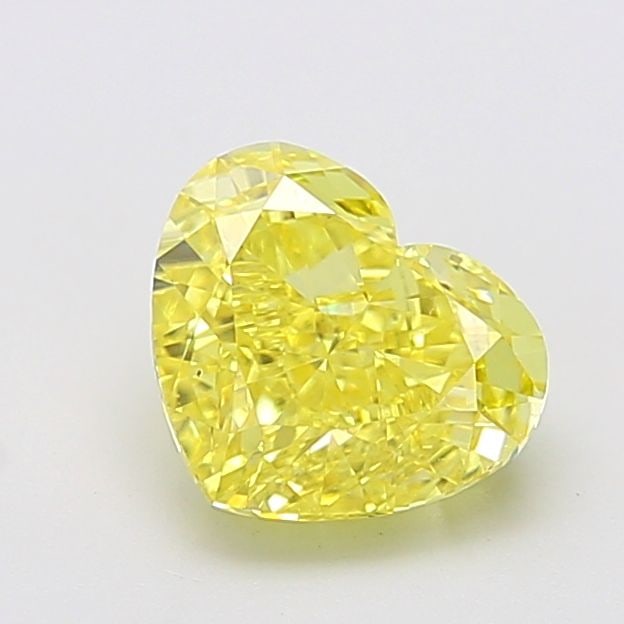 Loose Diamond - HEART 2.56ct Fancy Vivid Yellow VS1: Loose Diamond - HEART 2.56ct Fancy Vivid Yellow VS1 Source: This is a real non-mined Diamond that has been grown in a lab Shape: HEART Carats: 2.56 Color: Fancy Vivid Yellow Certification: IGI Video: