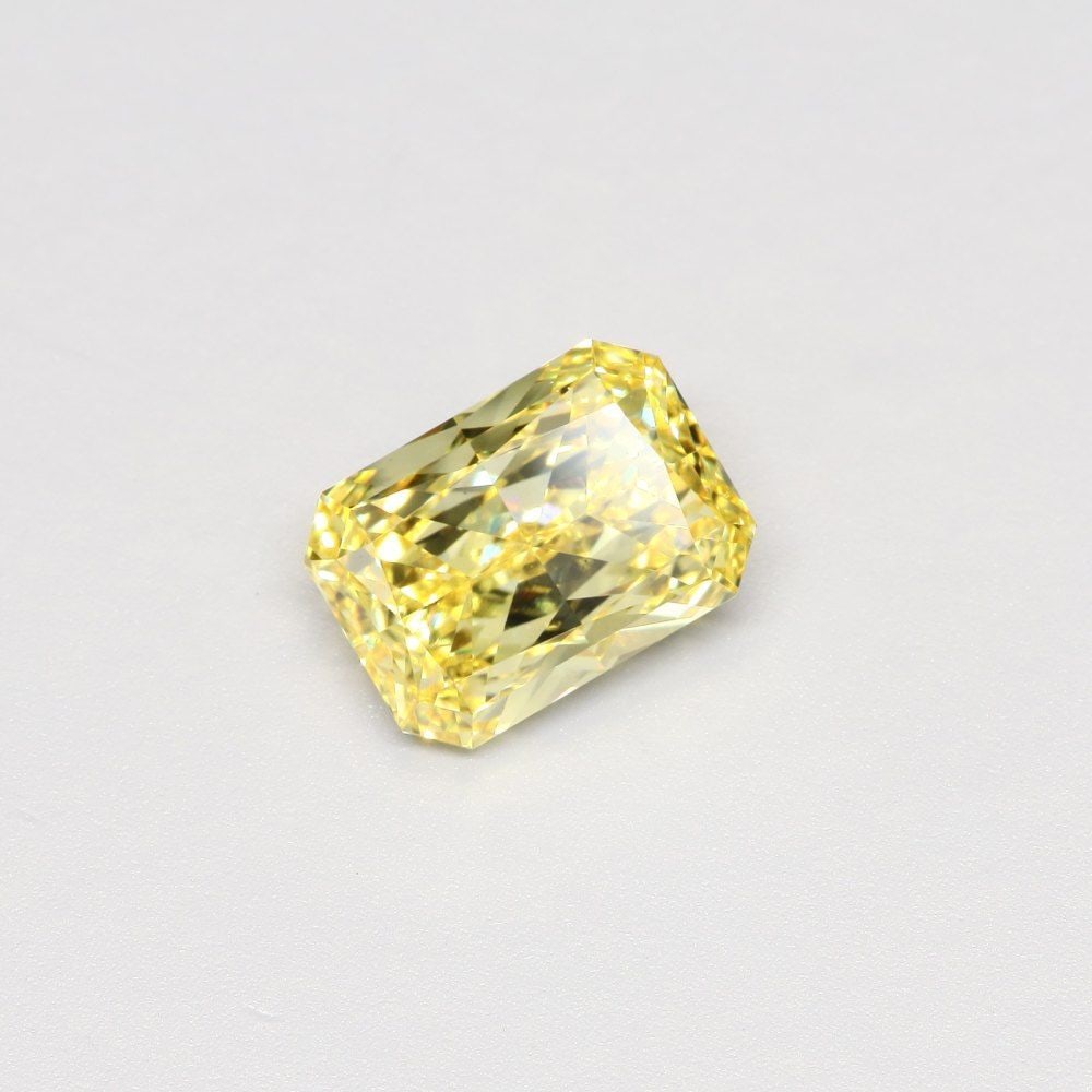 Loose Diamond - RADIANT 3.01ct Fancy Intense Yellow VS1: Loose Diamond - RADIANT 3.01ct Fancy Intense Yellow VS1 Source: This is a real non-mined Diamond that has been grown in a lab Shape: RADIANT Carats: 3.01 Color: Fancy Intense Yellow Certification: IGI