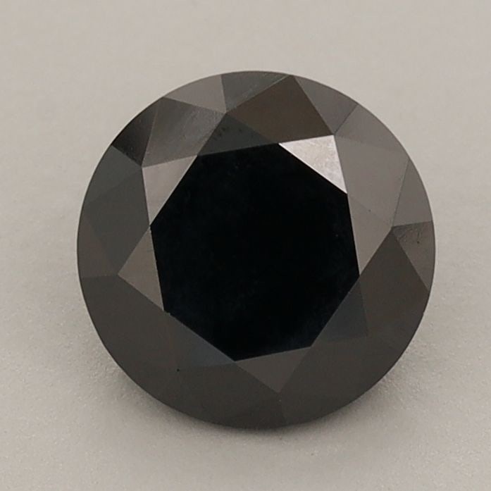 Loose Diamond - ROUND 1.38ct Fancy Black: Loose Diamond - ROUND 1.38ct Fancy Black Source: This is a real non-mined Diamond that has been grown in a lab Shape: ROUND Carats: 1.38 Color: Fancy Black Certification: IGI Video: