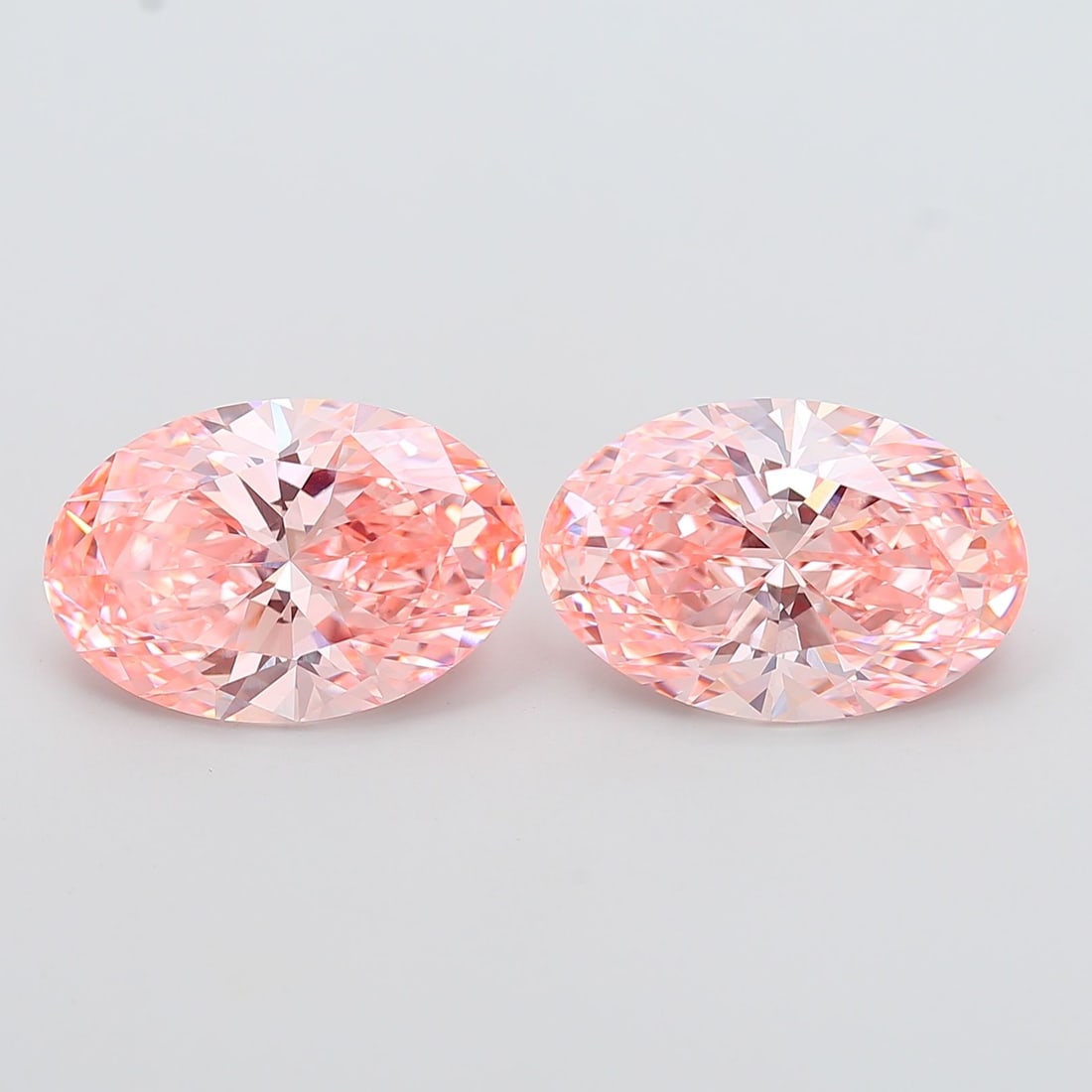 Loose Diamond - OVAL 6.04ct Fancy Vivid Pink VVS2: Loose Diamond - OVAL 6.04ct Fancy Vivid Pink VVS2 Source: This is a real non-mined Diamond that has been grown in a lab Shape: OVAL Carats: 6.04 Color: Fancy Vivid Pink Certification: IGI Video: