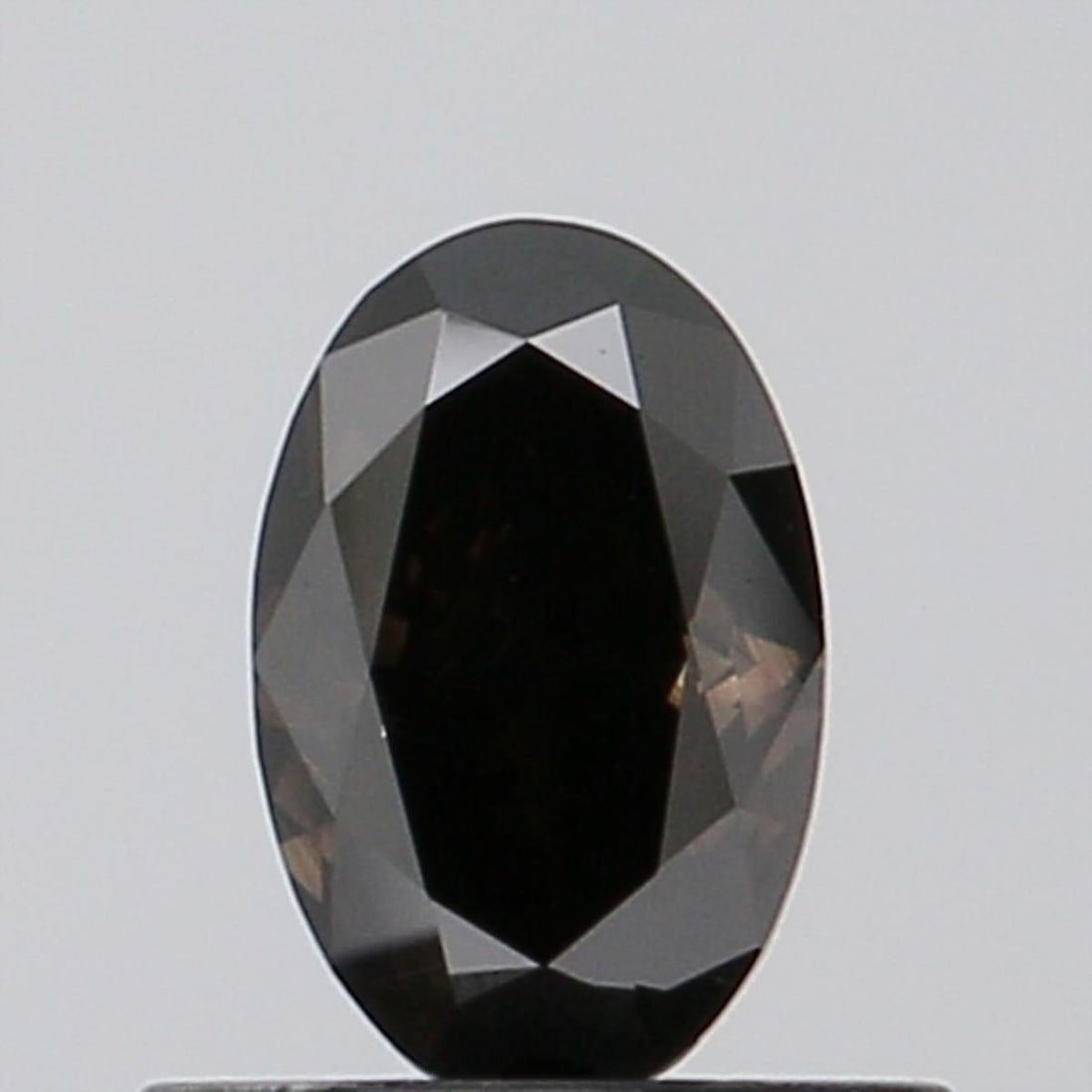 Loose Diamond - OVAL 0.61ct Fancy Deep Black VS2: Loose Diamond - OVAL 0.61ct Fancy Deep Black VS2 Source: This is a real non-mined Diamond that has been grown in a lab Shape: OVAL Carats: 0.61 Color: Fancy Deep Black Certification: NONE Video: