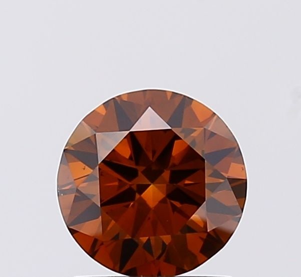 Ideal Loose Diamond - ROUND 1.01ct Fancy Deep Brown VS1: Ideal Loose Diamond - ROUND 1.01ct Fancy Deep Brown VS1 Source: This is a real non-mined Diamond that has been grown in a lab Shape: ROUND Carats: 1.01 Color: Fancy Deep Brown Certification: IGI
