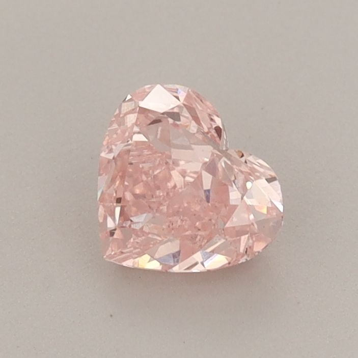 Loose Diamond - HEART 0.6ct Fancy Vivid Pink VS1: Loose Diamond - HEART 0.6ct Fancy Vivid Pink VS1 Source: This is a real non-mined Diamond that has been grown in a lab Shape: HEART Carats: 0.6 Color: Fancy Vivid Pink Certification: IGI Video: