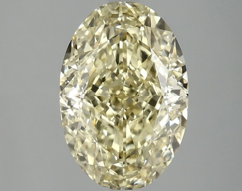 Loose Diamond - OVAL 3.09ct Fancy Intense Yellow VS1: Loose Diamond - OVAL 3.09ct Fancy Intense Yellow VS1 Source: This is a real non-mined Diamond that has been grown in a lab Shape: OVAL Carats: 3.09 Color: Fancy Intense Yellow Certification: IGI Video