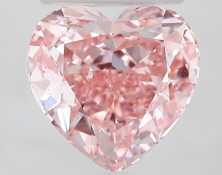 Loose Diamond - HEART 3.0ct Fancy Vivid Pink VS2: Loose Diamond - HEART 3.0ct Fancy Vivid Pink VS2 Source: This is a real non-mined Diamond that has been grown in a lab Shape: HEART Carats: 3.0 Color: Fancy Vivid Pink Certification: IGI Video: