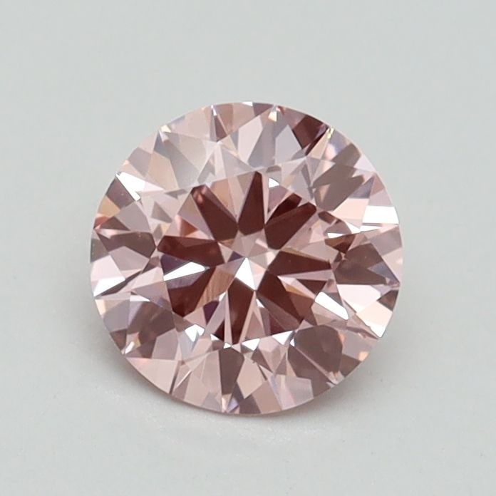 Loose Diamond - ROUND 0.7ct Fancy Intense Pink VS2: Loose Diamond - ROUND 0.7ct Fancy Intense Pink VS2 Source: This is a real non-mined Diamond that has been grown in a lab Shape: ROUND Carats: 0.7 Color: Fancy Intense Pink Certification: IGI Video: