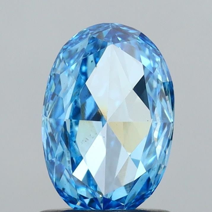 Loose Diamond - OVAL 1.01ct Fancy Vivid Blue VS2: Loose Diamond - OVAL 1.01ct Fancy Vivid Blue VS2 Source: This is a real non-mined Diamond that has been grown in a lab Shape: OVAL Carats: 1.01 Color: Fancy Vivid Blue Certification: IGI Video: