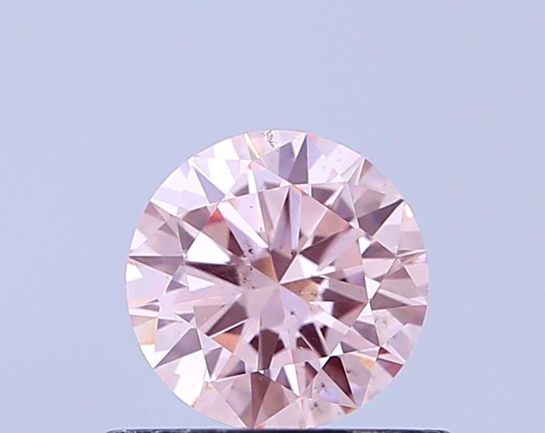 Loose Diamond - ROUND 0.53ct Fancy Intense Pink SI1: Loose Diamond - ROUND 0.53ct Fancy Intense Pink SI1 Source: This is a real non-mined Diamond that has been grown in a lab Shape: ROUND Carats: 0.53 Color: Fancy Intense Pink Certification: IGI Video: