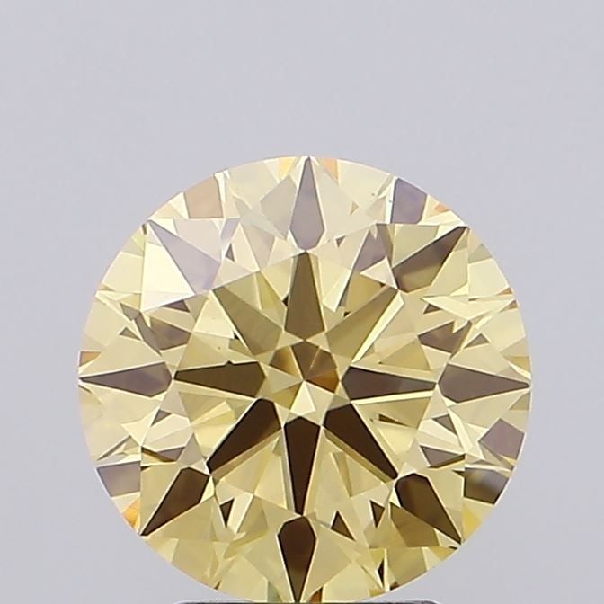 Ideal Loose Diamond - ROUND 2.1ct Fancy Yellow VS1: Ideal Loose Diamond - ROUND 2.1ct Fancy Yellow VS1 Source: This is a real non-mined Diamond that has been grown in a lab Shape: ROUND Carats: 2.1 Color: Fancy Yellow Certification: IGI Video: