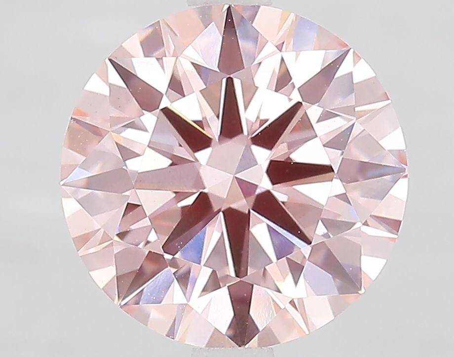 Ideal Loose Diamond - ROUND 2.81ct Fancy Vivid Pink VS1: Ideal Loose Diamond - ROUND 2.81ct Fancy Vivid Pink VS1 Source: This is a real non-mined Diamond that has been grown in a lab Shape: ROUND Carats: 2.81 Color: Fancy Vivid Pink Certification: IGI Video