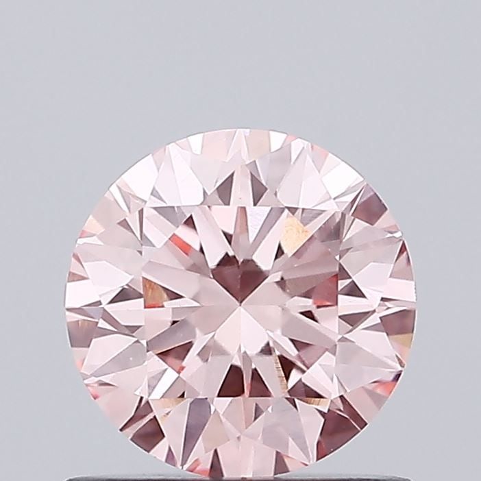 Ideal Loose Diamond - ROUND 0.78ct Fancy Vivid Pink VVS2: Ideal Loose Diamond - ROUND 0.78ct Fancy Vivid Pink VVS2 Source: This is a real non-mined Diamond that has been grown in a lab Shape: ROUND Carats: 0.78 Color: Fancy Vivid Pink Certification: IGI