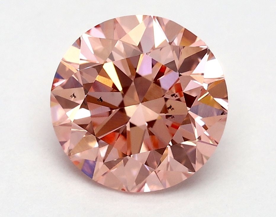Loose Diamond - ROUND 1.5ct Fancy Vivid Pink SI1: Loose Diamond - ROUND 1.5ct Fancy Vivid Pink SI1 Source: This is a real non-mined Diamond that has been grown in a lab Shape: ROUND Carats: 1.5 Color: Fancy Vivid Pink Certification: IGI Video: Video