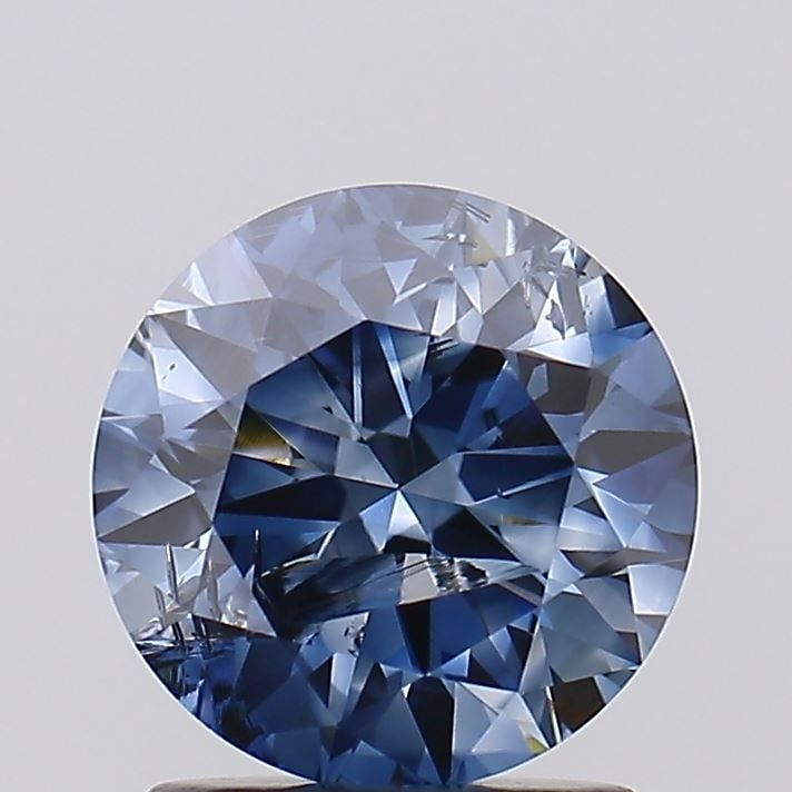 Loose Diamond - ROUND 1.6ct Fancy Vivid Blue I2: Loose Diamond - ROUND 1.6ct Fancy Vivid Blue I2 Source: This is a real non-mined Diamond that has been grown in a lab Shape: ROUND Carats: 1.6 Color: Fancy Vivid Blue Certification: NONE Video: Video