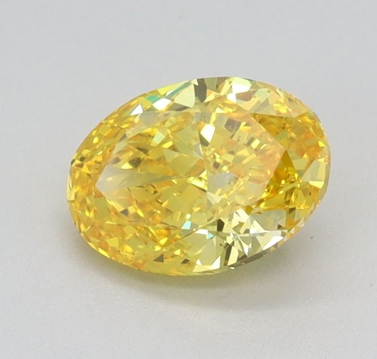 Loose Diamond - OVAL 0.72ct Fancy Vivid Yellow VS1: Loose Diamond - OVAL 0.72ct Fancy Vivid Yellow VS1 Source: This is a real non-mined Diamond that has been grown in a lab Shape: OVAL Carats: 0.72 Color: Fancy Vivid Yellow Certification: IGI Video: