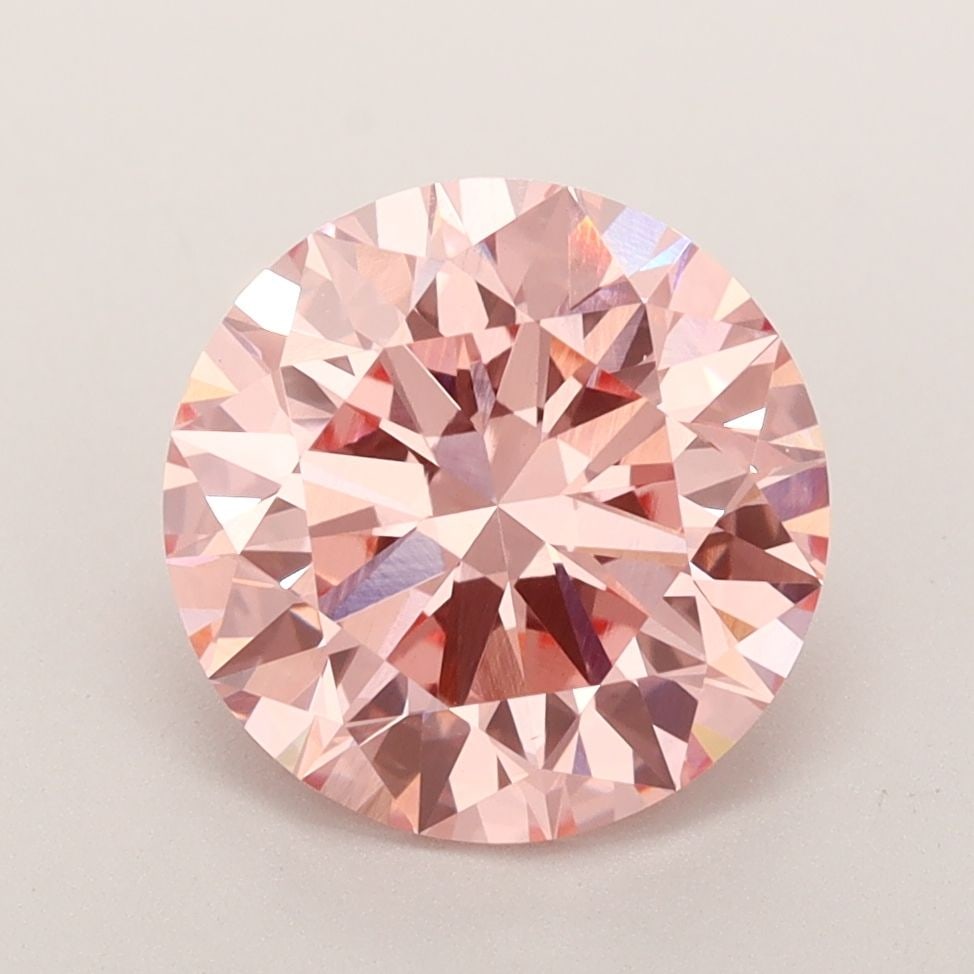 Ideal Loose Diamond - ROUND 3.15ct Fancy Vivid Pink VS1: Ideal Loose Diamond - ROUND 3.15ct Fancy Vivid Pink VS1 Source: This is a real non-mined Diamond that has been grown in a lab Shape: ROUND Carats: 3.15 Color: Fancy Vivid Pink Certification: IGI Video