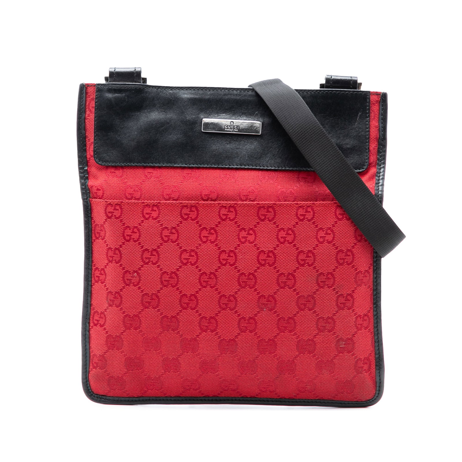 Gucci GG Canvas Red Crossbody Bag with Leather Trim: Gucci GG Canvas Red Crossbody Bag with Leather Trim Gucci GG Canvas Crossbody bag in red fabric with leather trim. This crossbody style features an adjustable flat shoulder strap, an open top with tou